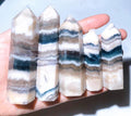 Blue Fluorite Growing with Agate Towers